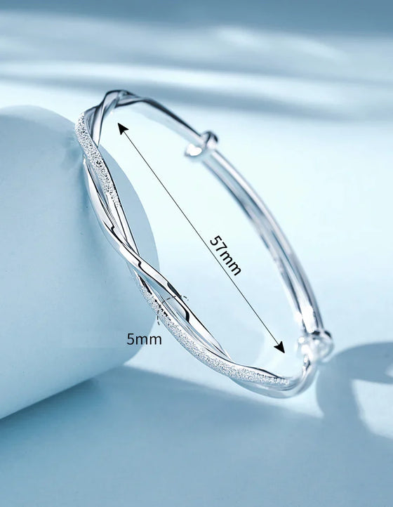 Bellissimo bracciale intrecciato in argento