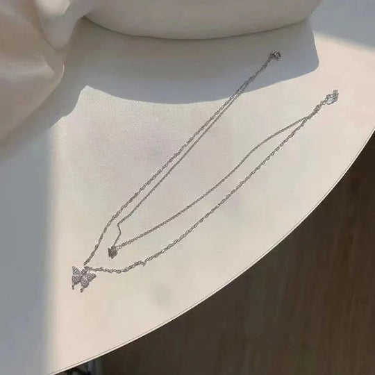 Refined Silver Necklace Set with Shimmering Butterfly
