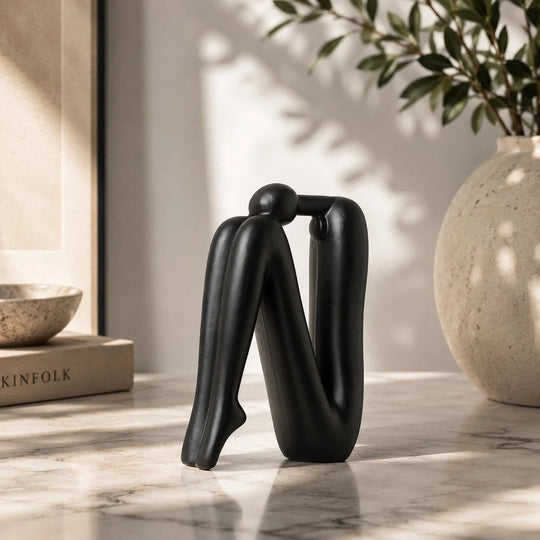 Boekensteunen – Sculpturaal Porselein voor de Boekenkast