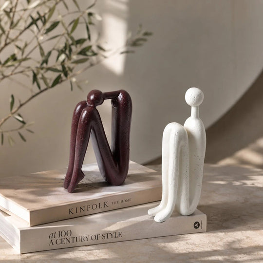 Boekensteunen – Sculpturaal Porselein voor de Boekenkast