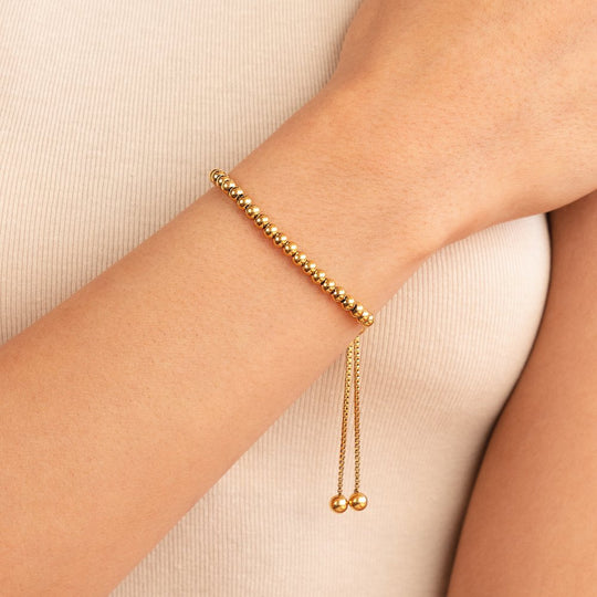 Gouden armband met kralen